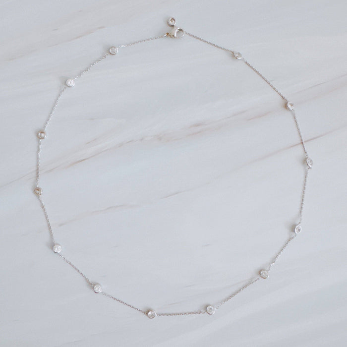 A Dozen Of Bezel Sparkle Station Necklace